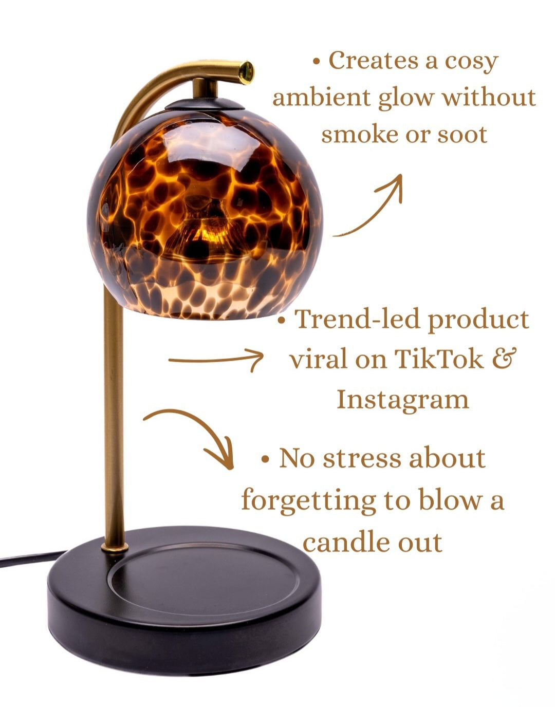 decorative candle warmer lamp made of blown glass with a warm amber, brown, and black tortoiseshell pattern, featuring a rounded base and a matching dome shade.