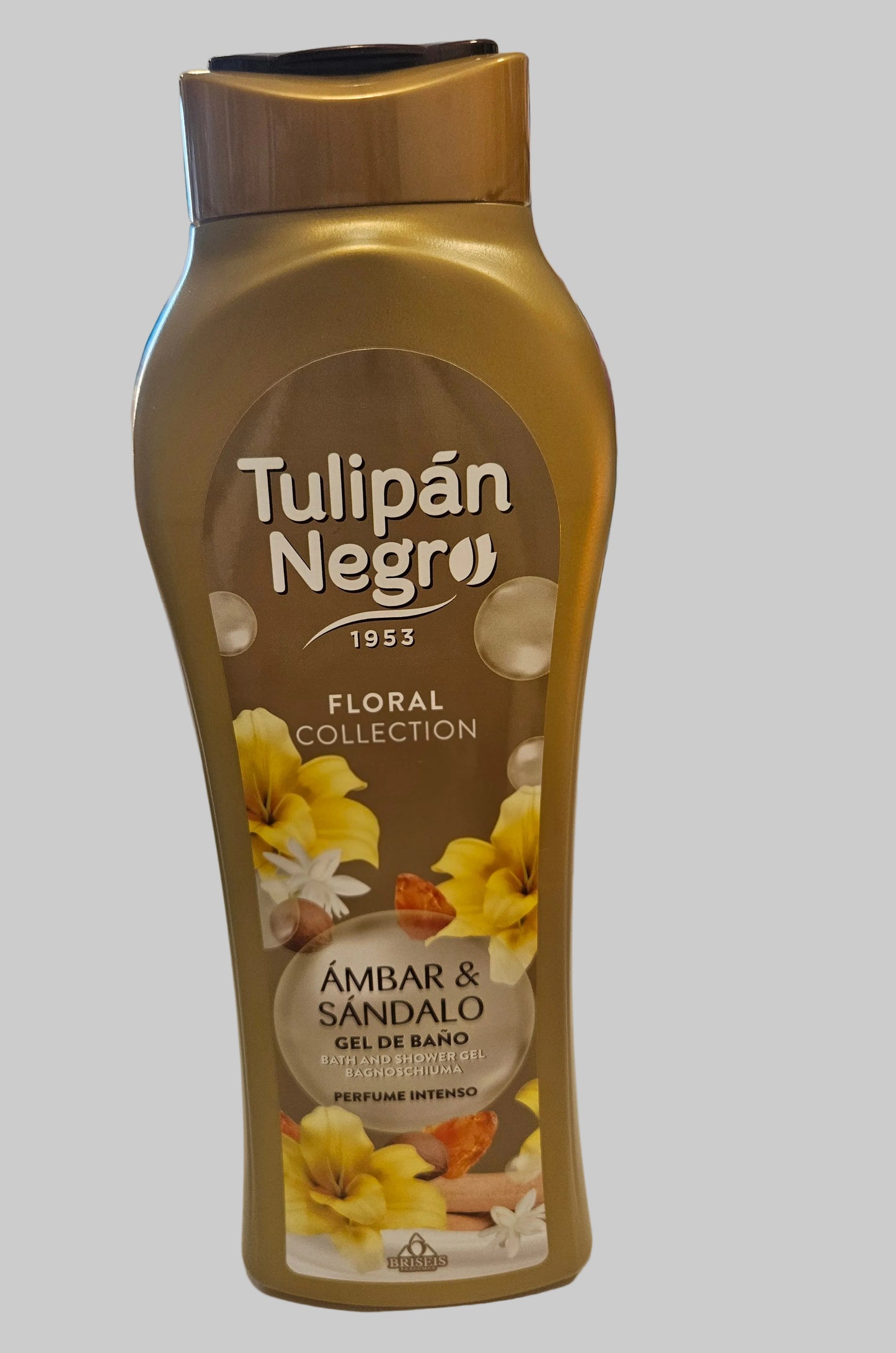 A bottle of Tulipán Negro 1953 Floral Collection body wash, specifically the Ámbar & Sándalo scent.